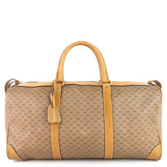 Gucci Bags Gucci Gg Coated Canvas Travel Bag Poshmark